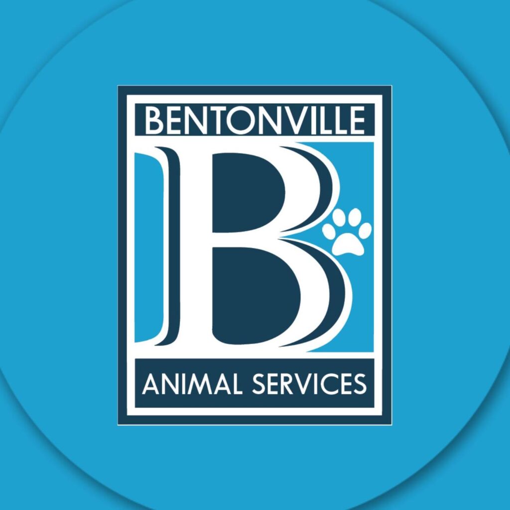 Bentonville Animal Services logo with a large letter “B” and a paw print on a blue circular background.