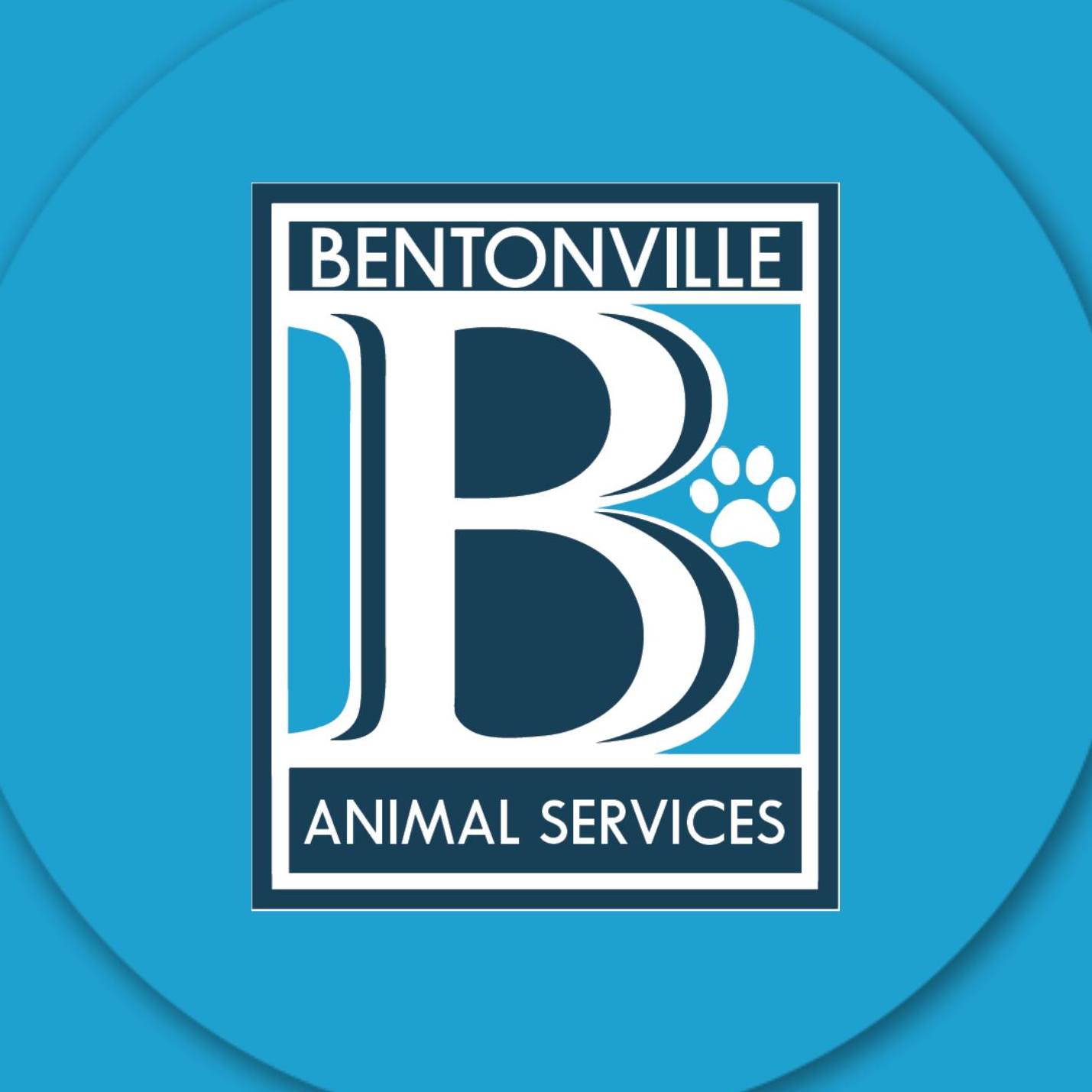 Bentonville Animal Services logo with a large letter “B” and a paw print on a blue circular background.